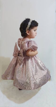 Your little one will be the most beautiful princess in this sparkly puffy dress! Pink Princess Holiday Dress For Party Season, Elegant Pink Princess Dress For Festive Occasions, Princess Style Glitter Dress For Dress-up, Pink Glitter Dresses For Party Season, Pink Glitter Dress For Party Season, Holiday Embellished Sequin Dress For Dress-up, Festive Sequin Glitter Tulle Dress, Pink Sequin Glitter Dress For Holiday, Pink Festive Dress With Sequins