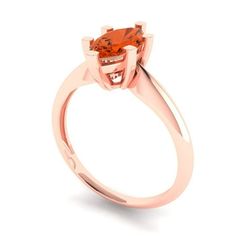 an orange diamond ring on a white background