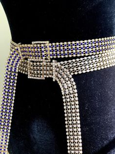 Gorgeous Rhinestone belt! the perfect statement piece to spark any outfit.Available with Black or blue rhinestones.💎Adjustable 💎 Belt width : 1.37” ( 3.5 cm ) 💎 Buckle width : 1.77 “ (4.5cm)  💎 Length:41’ inchesFollow us in Instagram: @kyboutique4SHARE YOUR PICTURES IN INSTAGRAM #kyboutique4Website: Visit un also on the webwww.kyboutique4.com Please make sure to read my Shipping Terms & Conditions Information prior to making a purchase. Luxury Silver Belt With Rhinestones, Adjustable Silver Belt With Bling, Adjustable Silver Belts With Bling, Adjustable Gold Party Belt, Silver Rhinestone Belts For Formal Occasions, Silver Rhinestone Belt For Party, Silver Bling Belts For Party, Silver Adjustable Belt With Rhinestones, Silver Party Belt With Bling