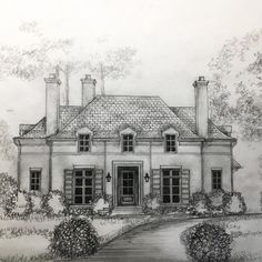 a drawing of a house that is in the process of being drawn by someone's hand