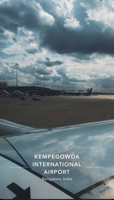 an airplane wing with the words kemppegowda international airport on it