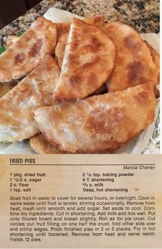 fried pies sitting on top of a white plate