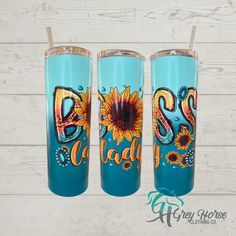 three personalized tumblers with sunflowers and the letters b, c, d