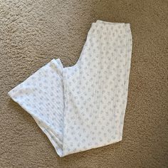 Cozy Light Weight Low Rise Pajama Pants In Ivory With The Baby Blue Teddy Bear Print With An Elastic Waistband Fabrics: 100% Cotton Measurement: 11" (28 Cm) Rise, 28" (71 Cm) Inseam, 26" (66 Cm) Waist (Stretches) Made In: Italy White Cotton Sleepwear With Elastic Waistband, White Sleepwear With Elastic Waistband, White Bottoms With Elastic Waistband For Bedtime, White Sleepwear With Elastic Waistband For Sleepover, Cozy White Sleep Pants, Casual White Sleep Pants, Cozy White Long Pants, White Lounging Bottoms Long Pants, White Wide Leg Sleepwear With Elastic Waistband