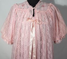 Here is a very special, rare 1960's bedroom night gown and robe set that has an original and collectible made in USA union stamp label. This sweet 60s lounge wear set is in a pink synthetic blend (acetate and nylon) sheer material with fabulous off lace trim and a very long maxi A line sweeping cut with romantic, half sleeves and beautifully tailored details. You'll love feeling like a dream in this lovely, fancy yet so comfy wonderful 2 piece addition to your lounge wear. This midcentury vintag Vintage Nightgown With Ruffles For Loungewear, Vintage Ruffled Nightgown For Loungewear, Vintage Spring Robe For Home, Vintage Pink Sleepwear, Vintage Pink Robe For Loungewear, Vintage Lace Sleepwear For Bedtime, Vintage Pink Sleepwear For Wedding Night, Vintage Lace Nightgown For Sleep, Vintage Lace Sleepwear