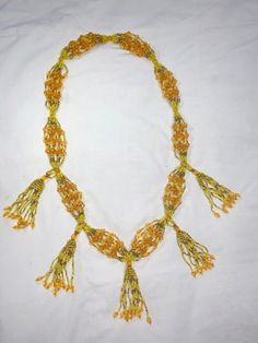 Collar de Mazo para Oshun / Mazo Necklace for Orisha Oshun Traditional Orange Necklace For The Beach, Artisan Yellow Beaded Chain Necklace, Artisan Yellow Necklace For Beach, Yellow Artisan Jewelry For Beach, Handwoven Necklace For Beach, Traditional Orange Jewelry For Beach, Unique Yellow Necklaces For Beach, Traditional Orange Beach Jewelry, Yellow Bohemian Hand-strung Necklaces