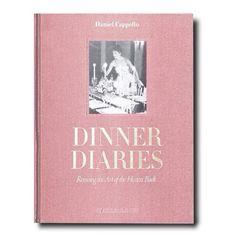 a pink book with the title dinner diaries