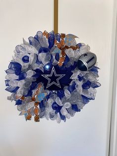 a football wreath hanging on the front door