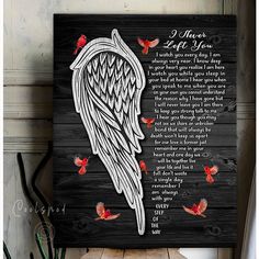 a wooden sign with an angel's wings on it and the words, i love you