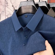 Blue Polo Shirt With Spread Collar, Blue Polo Shirt With Spread Collar For Work, Blue Spread Collar Polo Shirt For Work, Blue Collared Polo Shirt For Business Casual, Blue Polo Collar Top For Formal Occasions, Formal Blue Polo Collar Top, Blue Formal Polo Collar Top, Blue Collared Top For Business, Elegant Blue Polo Collar Top