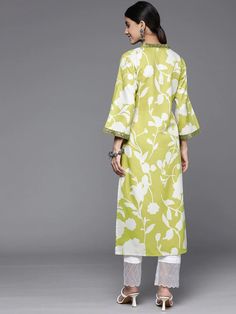 Get ready to be the center of attention with this quirky Lime Green Cotton Printed Kurta. Featuring sparkling sequin detailing, this kurta is perfect for adding some fun and playfulness to any outfit. The soft cotton fabric guarantees ultimate comfort while the vibrant lime green color will make you stand out in the crowd. Add a touch of spunk to your wardrobe with this unique kurta. No. of pieces - 1 piece. Color - Lime Green. Fabric - Cotton. Washing Instructions - Dry Clean. Bollywood Style Kurta With Mirror Work For Spring, Spring Party Kurta With Mirror Work, Spring Sets With Mirror Work And Long Sleeves, Spring Cotton Kurta With Mirror Work, Cotton Party Kurta With Mirror Work, Cotton Kurta For Eid Party, Bollywood Style Cotton Sets For Spring, Party Cotton Kurta With Mirror Work, Festive Cotton Kurta With Sequins