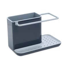 a gray and white kitchen utensil holder