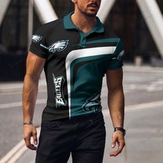 a man is walking down the street wearing a philadelphia eagles polo shirt