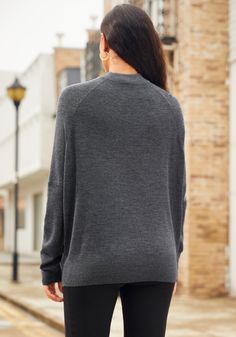 Indulge in the lightweight warmth and softness of the SoftBlend Merino Dolman Sweater. With its oversized fit, ribbed texture and wide dolman sleeves, it’s the epitome of chic meets comfort. A true wardrobe chameleon, it effortlessly transitions from daywear to evening grace. Loose, oversized fit, with dolman sleeves. 25½ inches from top of shoulder to hem (size S). Model wears size small. Merino wool blend (gray). 50% merino wool, 50% acrylic. Turn inside out, then machine was cold, gentle cycl Dolman Sweater, Ribbed Texture, Dolman Sleeve, Charcoal Grey, Oversized Fits, Merino Wool, Wool Blend, Inside Out, Turn Ons