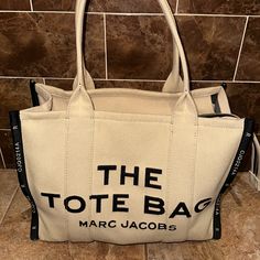 Marc Jacobs The Tote Bag Canvas Tote Medium New With Tags Everyday Bucket Shoulder Bag With Logo, Logo Bucket Shoulder Bag For Everyday Use, Everyday Bucket Bag With Logo, Everyday Bucket Bags With Logo, Logo Tote Canvas Bag For Errands, Everyday Use Bucket Bags With Logo, Tan Bags With Logo For Errands, Tan Logo Bags For Errands, Tan Logo Tote Bag