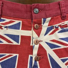 "Vintage 1960's Mod Union Jack UK Pop Art Denim Shorts. Good condition. General wear. (see photos) The label is \"Tads\". Original 1960's. Pop art Union Jack denim shorts. Please check measurements for size. All Sales Final. Please ask any questions before purchase. Take a look at our Store for more Vintage Clothing - VintageOnHollywood. Waist: 30\" Length: 2 3/4\"" Retro Red Shorts With Pockets, Retro Cotton Patchwork Shorts, Red Vintage Summer Shorts, Retro Denim Bottoms With Built-in Shorts, Union Jack Clothes, Beatnik Style, 60’s Mod, Vintage Denim Shorts, Crochet Lace Trim