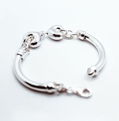 Brand: Argentidea Jewelry Instagram: https://www.instagram.com/gioielli_argentidea/ Size: One size Weight: 17g. Silver colour Women's bracelet, in 925 silver, central motif with double jointed hearts. The hearts are 16mm wide. Side round tube with an external diameter of 5 mm. The bracelet features an oval lobster clasp. The bracelet is the natural color of silver, manually polished to a shiny finish. A completely handcrafted jewel, conceived, designed, produced and finished entirely by hand by Double Jointed, Logo Jewelry, Handcrafted Silver Jewelry, Jewelry Instagram, Silver Colour, Carrier Bag, Chain Link Bracelet, Womens Bracelets, Natural Color