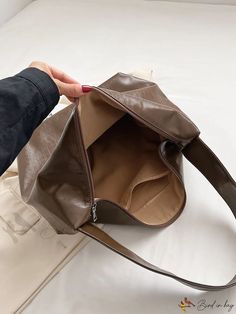 Bird in Bag - Large Capacity Handheld Single-Sided Amplifier Tote Bag Large Capacity Leather Bag In Khaki, Large Capacity Leather Shoulder Bag In Khaki, Large Capacity Khaki Leather Bag, Functional Large Capacity Square Shoulder Bag, Khaki Leather Shoulder Bag With Large Capacity, Trendy Rectangular Khaki Hobo Bag, Khaki Travel Bucket Bag With Large Capacity, Khaki Bucket Bag With Large Capacity For Travel, Brown High-capacity Bag For Everyday Use