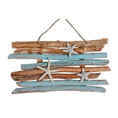 driftwood wall hanging with starfish and seashells