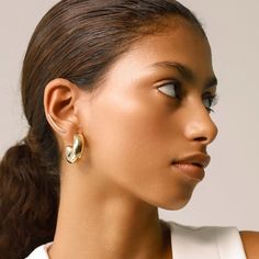 Elevate every look with our bold Bagel Hoop earrings - your go-to statement accessory for daily wear and casual outings alike. Perfectly versatile, they add a touch of sophistication to any ensemble, ensuring you're stylishly accessorized all day long 18k gold plated stainless steel 30mm diameter 10mm wide Hair Unit, Polish Jewelry, Rhodium Plated, Stylish Outfits, Solid Gold, Daily Wear, 18k Gold, Hoop Earrings, Stainless Steel