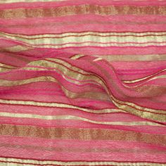 pink and gold striped fabric with metallic stripes