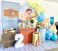 a birthday party with balloons and decorations