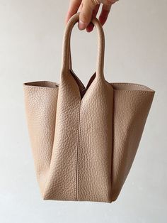 Elena Handbags Chic Leather Bucket Bag Tan Bucket Bag With Handles, Handheld Beige Bucket Bag With Removable Pouch, Tan Bucket Bag For Everyday Use, Beige Bucket Box Bag For Everyday, Beige Everyday Bucket Box Bag, Everyday Beige Bucket Box Bag, Beige Handheld Satchel In Soft Leather, Beige Bucket Satchel For Shopping, Beige Soft Leather Handheld Bag