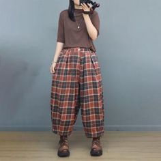 Plaid Baggy Wide Leg Bottoms, Baggy Plaid Wide Leg Bottoms, Baggy Brown Vintage Bottoms, Brown Wide Leg Bottoms With Buttons, Vintage Baggy Brown Bottoms, Plaid Wide-leg Pants With Pockets, Casual Baggy Plaid Bottoms, Wide-leg Plaid Bottoms With Pockets, Casual Plaid Wide-leg Bottoms