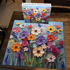 two puzzles with flowers on them sitting next to each other