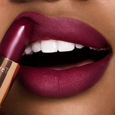 A magic deep purple berry matte lipstick Purple Matte Lipstick, Magenta Lipstick, Revolution Lipstick, Charlotte Tilbury Matte Revolution, Plum Lipstick, Lipstick For Dark Skin, Berry Lipstick, Glossier Lipstick, Perfect Lipstick