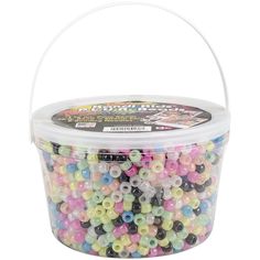 a bucket filled with lots of colorful beads