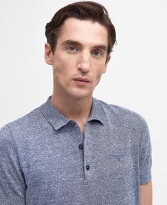 The Barbour Buston knitted polo shirt offers a short sleeved silhouette with a ribbed hem for a smart fit. Complete with a three button placket and an embroidered logo on the chest. Casual Cotton Polo Sweater With Short Sleeves, Casual Short Sleeve Polo Sweater With Seamless Collar, Business Casual Short Sleeve Polo Shirt With Ribbed Collar, Casual Knit Polo Shirt With Collared Neckline, Casual Knit Polo Shirt With Polo Collar, Casual Knit Polo Shirt With Johnny Collar, Knit Polo Shirt With Seamless Collar And Short Sleeves, Cotton Polo Sweater With Seamless Collar, Knit Polo Shirt With Polo Collar