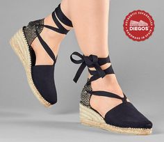 "Diegos high wedge black-2 Lola espadrilles for women. Wedge sole height : 2,5\" (6 cm) Classic high wedge lace-up Lola espadrilles with traditional ankle wrap ribbons. To improve comfort, a padded insole is hand-sewn to the jute wedge sole of the espadrilles. True to Spanish tradition, the cotton canvas is entirely hand-stitched to the jute rope sole. We ship from NY - Easy returns." Low Wedge Espadrilles, Spanish Shoes, Ivory Flats, Lace Espadrilles, Espadrilles Shoes, Northern Spain, Wedge Espadrilles, High Wedges, Low Wedges