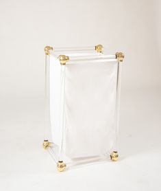 an empty white box with gold handles