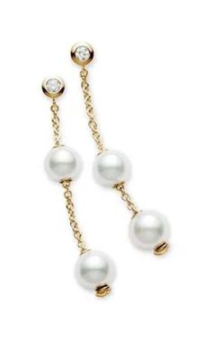 Mikimoto Earrings Pearls in Motion Akoya Pearls White (PEL644DK). 18kt yellow gold earrings with 2 white Akoya pearls each of 7x7.5mm and 0.14ct of diamonds. The pearls move along the chain and stay in place due to a unique mechanism. Mikimoto Earrings, Diamond Accessories, Silver Heart Earrings, Yellow Gold Earrings, Square Diamond, Akoya Pearls, Oval Cut Diamond, Princess Diamond, Womens Wedding Bands