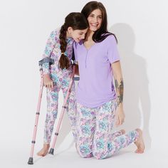 Unleash your inner superhero with our Comic Purple Bamboo Women's Pajama Set! Made from luxurious bamboo fabric, this set is as soft as a cloud and as vibrant as a comic book. Featuring a playful purple design with comic-inspired prints, it's the perfect blend of comfort and fun. Whether you're lounging at home or saving the world in your dreams, this pajama set has got you covered. Upgrade your sleepwear collection today! Stylish and Functional Top: Scoop neck long-sleeve top with elegant snaps Playful Purple Sets For Pajama Party, Stretch Purple Sleepwear For Loungewear, Casual Purple Bedtime Sets, Playful Purple Sleepwear For Pajama Party, Purple Stretch Sleepwear For Pajama Party, Stretch Cotton Purple Sleepwear, Purple Cotton Stretch Sleepwear, Stretch Cotton Sleepwear In Purple, Purple Bamboo