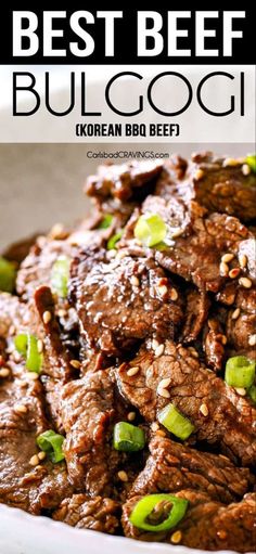 beef with sesame seeds and green onions in a white bowl