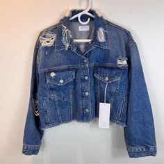 New With Tags! Boyish The Harvey Distressed/Destroyed Raw Hem Denim Jean Jacket. Size Small. *Runs Large (So Probably More Like A Medium, Please See Measurements Below). Wash: Conversation (Blue). Msrp $188. Approx Measurements (Laying Flat, Not Stretched): Armpit To Armpit: 22” Armpit To End Of Sleeve: 16.5” Front Length (Neckline To Bottom Hem): 15” Back Length (Below Collar To Bottom Hem): 17.5” Medium Wash Cropped Ripped Outerwear, Ripped Cropped Denim Outerwear, Cropped Ripped Medium Wash Outerwear, Distressed Cropped Denim Outerwear, Cropped Distressed Denim Outerwear, Ripped Cropped Denim Jacket, Distressed Clothing, Denim Jean Jacket, Denim Jean