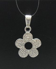 Sterling silver pendant - PE000418. APPROXIMATE Weight 2.2 grams. Diameter 1.8cm(0.72inches)All our jewels are made from solid sterling silver 925/1000 and are carefully crafted by hand in our family workshop.We dispatch your orders in 5 working days, worldwide and the postage is $5. We ship registered priority mail. Please allow 5-7 working days for delivery in Europe and 10-15 working days outside Europe.For any questions – please do not hesitate to contact me! Sterling Silver Flowers, Classic Ring, Silver Flowers, Flower Pendant, Sterling Silver Pendant, Sterling Silver Pendants, Priority Mail, Silver 925, Bulgaria