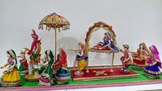 a group of figurines sitting on top of a table