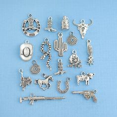 Cowboy themed collection of antique silver tone charms, in a zinc alloy metal. Perfect for bracelets, pendants, earrings, zipper pulls, bookmarks and key chains! Measurements: 10mm - 30mm Hole Size: 2mm You will receive 1 set of 18 charms. PLEASE NOTE: From time to time I may need to substitute one of the charms for another of equal or greater value... all keeping with the theme of the collection. Need more? Just send us a message through the contact us form, instant chat, or at mailto:info@bohe Nickel-free Silver Novelty Charms, Nickel Free Silver Themed Charms, Nickel-free Silver Themed Charms, Nickel-free Themed Silver Charms, Themed Silver Metal Charms, Novelty Personalized Silver Charms, Silver Novelty Charm Necklace, Crimp Bead Covers, Weave Shop