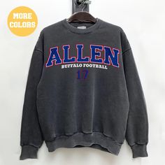 Perfect sweatshirt for any Josh Allen or Buffalo football fans this season! Ideal for any situation, a unisex heavy blend crewneck sweatshirt is pure comfort. These garments are made from polyester and cotton. This combination helps designs come out looking fresh and beautiful. The collar is ribbed knit, so it retains its shape even after washing. There are no itchy side seams on these sweaters.  .: 50% cotton, 50% polyester .: Medium-heavy fabric (8.0 oz/yd² (271.25 g/m .: Loose fit .: Sewn-in Fan Apparel Crew Neck Sweatshirt With Lettering, Fan Apparel Sweatshirt With Ribbed Cuffs And Crew Neck, Fan Apparel Sweater With Letter Print, Fan Gear Long Sleeve Sweatshirt With Letter Print, Sports Season Streetwear Sweatshirt With Lettering, Fan Apparel Sweatshirt With Relaxed Fit Crew, College Crew Neck Hoodie With Lettering, Winter Streetwear Sweatshirt With Team Name, Winter Fan Gear Sweatshirt With Crew Neck