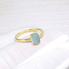 This handcrafted jewelry is made by Crystal Legacy . For each piece , we handpick the best gemstone and ensure high quality craftsmanship and intrinsic designing. Buy it for yourself of for your loved ones. Chalcedony Ring, Chalcedony Rings, Chalcedony Jewelry, Tiny Ring, Boho Ring, Promise Ring, 18k Gold Plated Brass Ring, Gold Ring, For Her, Gemstone -Chalcedony Weight - 3gm Stone Size -4x8mm Metal: Brass With 18k Gold Plated Each piece is ready in stock at our store in Vancouver, Canada. Exac Yellow Gold Chalcedony Jewelry Gift, Chalcedony Yellow Gold Jewelry For Anniversary, Yellow Gold Chalcedony Jewelry For Anniversary, Anniversary Yellow Gold Chalcedony Jewelry, Yellow Gold Chalcedony Ring Gift, Handmade Gold Topaz Ring For Gift, Handmade Gold Chalcedony Rings, Handmade Yellow Gold Topaz Ring Gift, Gold Chalcedony Jewelry For Anniversary