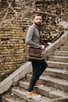 If you think it is time to ditch your old, tired-looking messenger bag, then check out our newest addition to the ever-popular shoulder carryall. No polyester material or plastic buckle in sight, this handcrafted messenger bag shows off high quality saddle leather and antique-coloured hardware. Long-term use will produce a deeper tone in the leather, adding character to it and enhancing the bag's overall appearance. Based on the traditional school satchel design, the bag has a large flap closure Brown Soft Leather Shoulder Bag For Outdoor, Brown Satchel Saddle Bag For Outdoor, Brown Leather Laptop Bag For Outdoor, Brown Saddle Bag Satchel For Outdoor, Outdoor Leather Shoulder Saddle Bag, Classic Crossbody Shoulder Bag For Outdoor, Rugged Brown Bag With Adjustable Strap, Classic Outdoor Crossbody Shoulder Bag, Brown Shoulder Laptop Bag For Outdoor Use