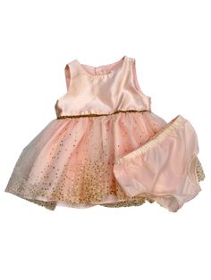 Infant & Toddler Girls Pink Satin Formal Holiday Sleeveless Dress Your baby girl will look beautiful in this light pink sleeveless dress! It is fully lined, has a three button placket back closure, and a double satin ruffled skirt with a glittery gold tulle overlay. Girl's Infant & Toddler sizes 100% Polyester Payment We accept PayPal as our payment method. Immediate payment is required. If you have any questions about payment, please feel free to contact our customer support team. Return Policy Fitted Princess Sleeveless Dress For Spring, Spring Princess Style Sleeveless Fitted Dress, Summer Princess Style Sleeveless Dress, Pink Princess Sleeveless Dress For Summer, Pink Princess Sleeveless Summer Dress, Pink Princess Style Sleeveless Summer Dress, Spring Sleeveless Fancy Dress, Sleeveless Dresses For Spring Fancy Dress, Pink Sleeveless Dress For Fancy Dress