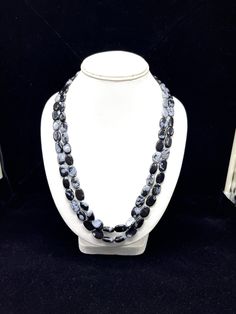 100 % Natural Top Black Opsidian smooth oval shape beaded necklace with adjustable silk cord closure Details: - Gemstone - Opsidian Shape - Oval Strand - 2 Calibration of beads - 10.13 millimeters till 10.15 millimeters Gross weight - 366.75 carats Net weight - 348.75 carats Length - 20 inches(inner) 22 inches (outer) SKU - HJSPSAR0143 100% NATURAL OPSIDIAN NOT HEATED NOT TREATED NOT DYED BLACK COLOR NECKLACE READY TO WEAR NECKLACE FOR WOMEN WEAR UNIQUE NECKLACE ATTRACTIVE NECKLACE AMAZING NECKL Classic Necklaces With Round Natural Stone Beads, Classic Necklaces With Round Natural Stones, Faceted Crystal Necklaces For Formal Occasions, Formal Round Faceted Crystal Necklaces, Formal Faceted Round Crystal Necklace, Adjustable Double Strand Faceted Necklaces, Adjustable Double Strand Faceted Necklace, Formal Necklace With Round Beads And Stones, Formal Necklaces With Round Beads And Stones