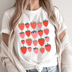 Cute Strawberry Shirt, Fall Harvest Shirt, Women Fall Shirt, Farmer Shirt, Cottagecore Shirt, Farmer Life Shirt, Autumn Tee 🎁 Welcome to IMA Apparel Co! We want to provide you with a delightful shopping experience, and we're here to assist you every step of the way. 🔍 Prior to finalizing your purchase, we recommend examining the images closely to ensure the size, color, and theme align with your preferences. Your satisfaction is our priority! 👕 Personalize your shirt effortlessly by selecting your preferred size and color from the easy-to-use menus. In the provided box, kindly specify your desired design color, referring to the available colors in the listing photos. 🔢 Need multiple shirts? No problem! Choose the quantity you desire and conveniently add them to your cart. Once you're r Red Fruit Print Graphic Tee, Red Graphic Tee With Fruit Print, White Crew Neck Top With Strawberry Print, White Short Sleeve Tops With Strawberry Print, Casual White Top With Strawberry Print, White Strawberry Print Shirt For Spring, White Casual Fruit Print Top, Casual White Tops With Fruit Print, Long Sleeve Cotton Tops With Strawberry Print