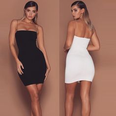 two women in black and white dresses, one is showing off her back to the camera