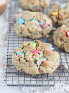 cookies with sprinkles and candy on a cooling rack