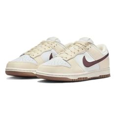 Elevate Your Sneaker Game With These Nike Dunk Low Next Nature Sneakers In Coconut Milk/Smoky Mauve Colorway. These Customized Sneakers Feature A Lace-Up Closure And Low-Top Shoe Shaft Style, Providing A Perfect Fit For Any Occasion. The Nike Dunk Model Is Known For Its Comfort And Cushioned Features, Making It An Excellent Choice For Everyday Wear. The Sneakers Are Made Of High-Quality Leather And Are Part Of The Nike Dunk Product Line. The Style Code Dd1873-103 Ensures That You Are Getting An Nike Beige Sneakers With Laces, Beige Nike Sneakers With Laces, Beige Sneakers With Contrast Sole, Sporty Cream Sneakers With Flat Heel, Sporty Cream Sneakers, Beige Casual Custom Sneakers With Round Toe, Brown Sneakers With Cushioned Footbed And Flat Heel, Casual Beige Custom Sneakers With Laces, Brown Sneakers With Cushioned Footbed